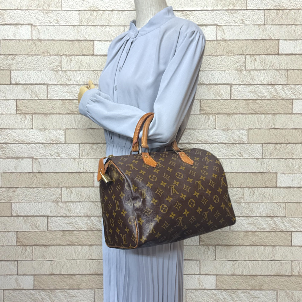 LOUIS VUITTON Louis Vuitton Speedy 30 Monogram Handbag Monogram