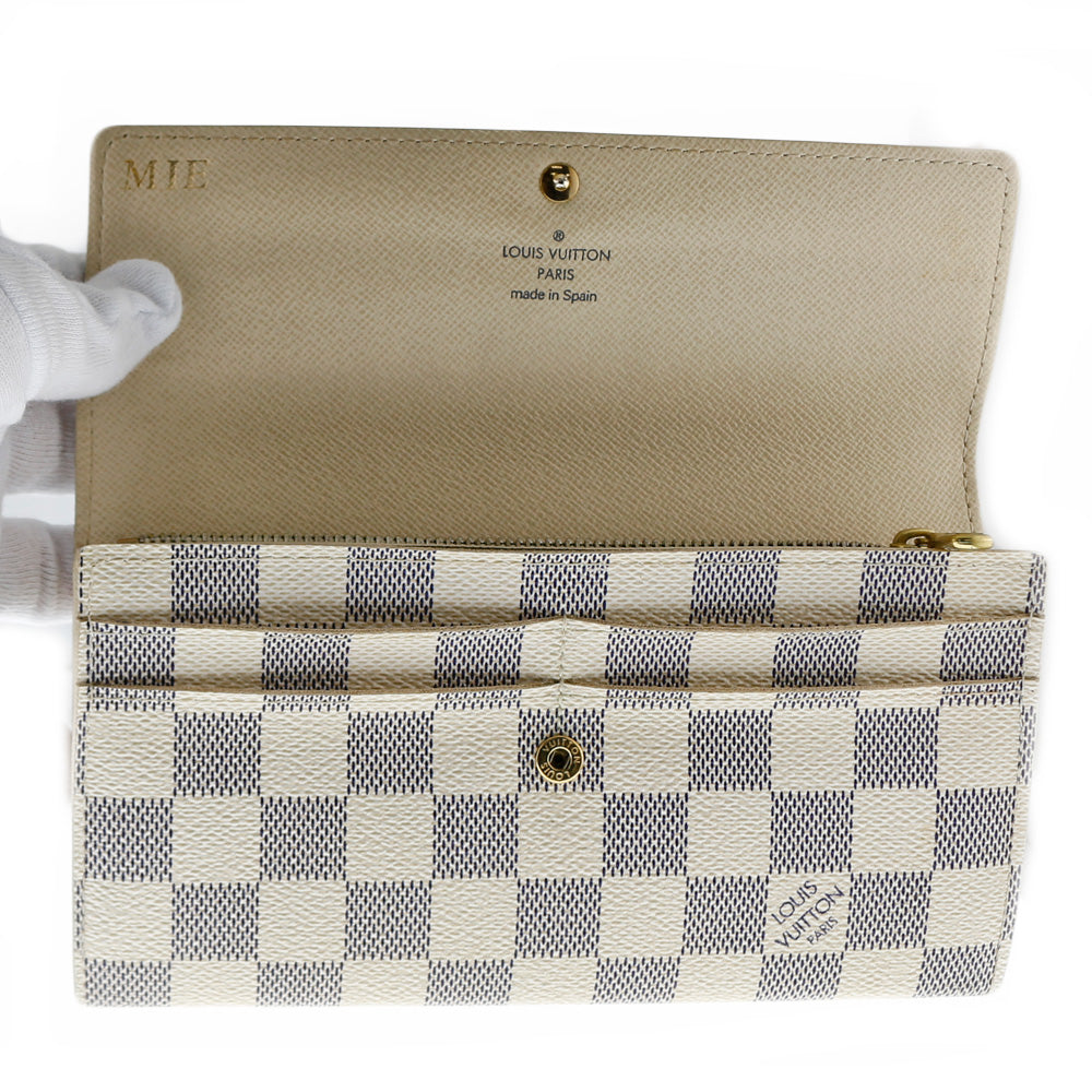 Louis Vuitton offers Damier Azur Sarah Wallet